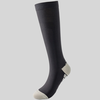 Chaussettes de compression en gros 20-30 mmHg unisexe pour la course à pied, le marathon, le cyclisme, le football et les varices