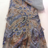 Tissu en dentelle perlée à plumes de paon, résistant et exclusif, tissu brodé en maille et sequins pour les mariages et les fêtes