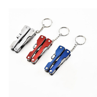Portable 8-en-1 EDC poche pliante Multitool randonnée Camping mini pince multi-outils avec lampe de poche porte-clés