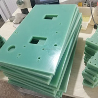 Pièces usinées multifonctionnelles personnalisées en isolation FR4 - Température d'exploitation de -40 à 250°C - Résistance à la traction de 320 MPa pour