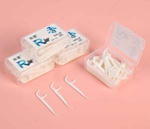Un bâtonnet de <span class=keywords><strong>fil</strong></span> <span class=keywords><strong>dentaire</strong></span> aromatisé à la menthe fraîche, adapté aux adultes et aux enfants pour nettoyer leur bouche - Product Image 4