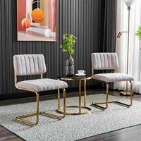 Chaise de salle à manger moderne en or design ergonomique de refroidissement pour la maison hôtel banquet école villa en cuir métal bois tissu