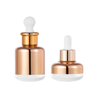 Soin de la peau de luxe essentiel or argent verre soin de la peau compte-gouttes bouche or bouchon compte-gouttes pressant flacon en verre 30ml