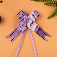 Ruban à nœud à tirer en gros avec bordure dorée pour l'emballage de cosmétiques, de parfums, de gâteaux, etc., décoration, nœud à tirer imprimé en forme de cœur de rose