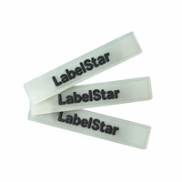 Etiquette en caoutchouc de silicone transparente et souple gaufrée 3D de logo de marque personnalisé pour vêtement