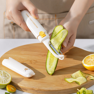 เครื่องปอกผลไม้แบบพกพา 2 in 1 สแตนเลสสตีลอเนกประสงค์สำหรับผลไม้และผัก - Product Image 2
