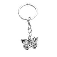 Date Creative Guyin en alliage de Zinc papillon printemps/été série porte-clés voiture suspendus accessoires usine directe en gros