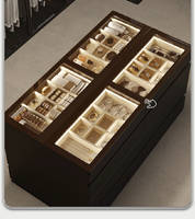 Meuble de rangement moderne pour bijoux avec îlot central et tiroirs double face pour chambre à coucher