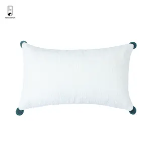 Funda de almohada con bordado geométrico de poliéster para decoración del hogar barata de fábrica de 50*30cm con pompón