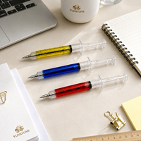 Stylo bille sur le thème médical, forme seringue, corps en plastique transparent, options de couleurs, écriture fluide, approvisionnement en gros pour cadeaux promotionnels