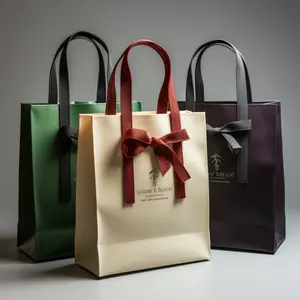 Venta al por mayor nuevo precio barato de lujo marca famosa regalo personalizado impreso bolsa de papel con su propio logotipo