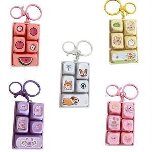 Venta al por mayor de llaveros sensoriales de 5 botones con sonido, diseño de animales de dibujos animados, para aliviar el estrés, como adorno para bolso - Product Image 1
