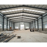 Hangar préfabriqué de structure en acier Hangar de bâtiment en acier de hangar en métal bon marché Entrepôt préfabriqué de structure en acier