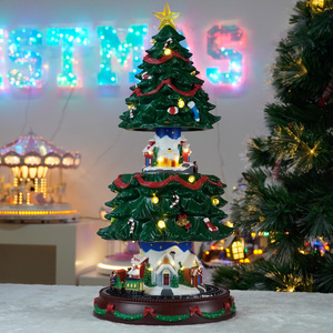 Aldea Animada de Plástico con Árbol de Navidad que Sube y Baja y Tren Giratorio con Luz LED y Música Decoración Navideña - Product Image 1