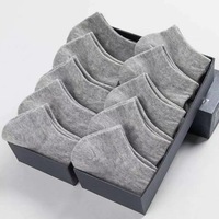 Chaussettes unisexes jetables de haute qualité en gros, coupe mi-mollet, avec logo tissé et revers antidérapant, décontractées pour l'automne