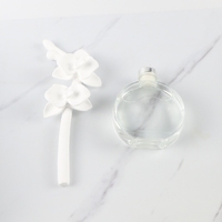 Diffuseur de parfum d'ambiance en céramique avec logo personnalisé, bouteille en verre 100 ml, fleurs en porcelaine, huile essentielle parfumée pour la maison