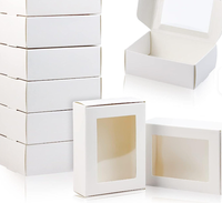 Boîtes rigides en carton ondulé avec fenêtre transparente personnalisée, revêtement UV et estampage pour l'emballage de cosmétiques, de savons et de bijoux