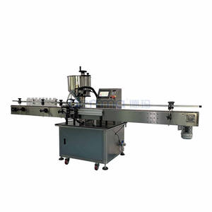 Máquina de llenado de líquidos industrial de 4 y 6 cabezales, llenadora rotativa especializada para latas, contenedores, botellas y bidones. - Product Image 2