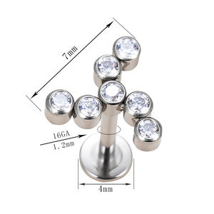 Factory Hot G23 ASTM F136 Titanio Roscado internamente Molino de viento Forma Labret Top Labret Anillos Pendiente - Product Image 1