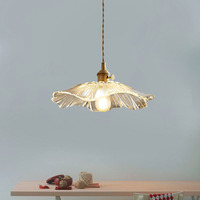 Estilo nórdico moderno minimalista latón colgante luz creativa hoja de loto cristal LED cabecera cobre Villa hogar Oficina