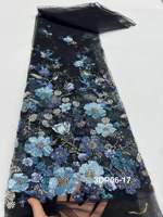 Tissu en dentelle à perles bleues pour robe, motif floral