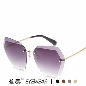 แว่นตา แว่นกันแดดไร้กรอบ โลหะสีทอง UV400 ผู้หญิง แฟชั่น เลนส์สไตล์โอเชี่ยน - Product Image 2