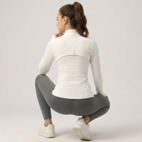 Veste de yoga ajustée pour femme à col montant, haut d'entraînement à manches longues entièrement zippé, veste de sport avec trous pour les pouces pour la course et le fitness