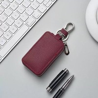 Porte-clés de voiture tendance en gros, étui souple en PU et cuir véritable avec fermeture éclair pour homme et femme, mini portefeuille pour clés