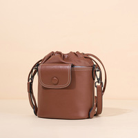 Nouveau sac hobo en cuir véritable, style sac seau à cordon, sac à bandoulière polyvalent pour femmes, pour un usage quotidien