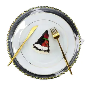 Vaisselle populaire de qualité supérieure largement utilisée pour la cuisine Assiette de présentation en perles de verre transparent Jante dorée irrégulière