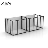 Cloison de réception en verre insonorisée pleine hauteur en aluminium, style moderne et minimaliste M&W, pour bureaux et projets.