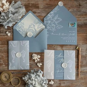 Invitación de Boda de Lujo en Papel Náutico Azul Polvoriento con Diseño de Caballito de Mar, Estrella de Mar, Coral y Concha, Sello de Cera e Impresión Personalizada - Product Image 1