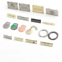 Dijes personalizados de Metal de aleación de Zinc para bolsos, etiquetas láser con logotipo de diseñador dorado en placas, de marca, en blanco