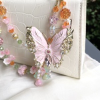 Cadena para teléfono móvil con diseño de mariposa, doble cadena, hecha a mano con cuentas, joyería de alta gama, colgante de borla de perlas, venta caliente transfronteriza