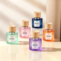 Botella de Perfume de Vidrio Esmerilado Cilíndrica de 30ml 50ml 100ml con Tapa de Madera, Botella de Spray con Color Personalizado, OEM ODM, Marca Privada