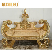 Fauteuil Baroque en feuille d'or, structure en bois dorée à la main, revêtement en cuir et tissu, canapé nuage pour hôtels et palais de luxe