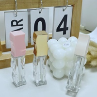 Vente en gros de tube de brillant à lèvres classique et magnifique conteneur d'emballage en forme de vague unique en plastique métallique design tubulaire pour rouge à lèvres