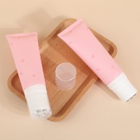 Tube multifonctionnel de compression de maquillage 100g120g avec interrupteur rotatif de tête de massage à 5 boules en alliage de zinc pour les soins du corps nettoyant