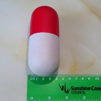 Balle anti-stress en forme de capsule en mousse PU