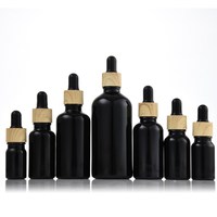5ml tabung kertas 10ml 15ml 20ml 30ml 50ml 100ml matte Minyak Esensial hitam serum botol penitis kaca dengan tutup aluminium bambu
