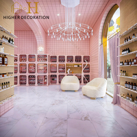 Meubles de magasin de cosmétiques de style rose, armoire de présentation de maquillage personnalisée avec éclairage LED pour magasin de beauté