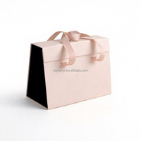Boîtes cadeaux pour festivals, boîtes d'emballage créatives à poignée, boîtes de présentation magnétiques, designs uniques de boîtes à parfum pour une présentation haut de gamme