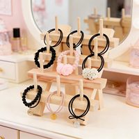 Support de rangement vertical pliable en bois moderne à quatre niveaux, multifonctionnel et écologique pour bobines et canettes