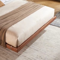 Lit double en bois massif de noyer noir d'Amérique du Nord avec tête de lit capitonnée en cuir, style moderne et simple pour chambre principale