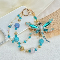 Breloque de téléphone perlée fleur bleue, cordon de poignet double couche pour téléphone, perles imitation nacre, porte-clés fait main, pendentif de sac, décoration
