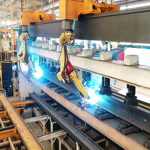 Cellule de travail robotique industrielle FANUC pour l'assemblage de précision automatisé, coordination multi-robots avec gabarits et dispositifs personnalisés - Product Image 3