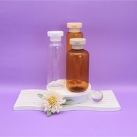 Bouteille ronde en PET pour soins personnels, emballage cosmétique transparent, bouteille cosmétique cylindrique avec pompe pour produits de lavage corporel, gel douche