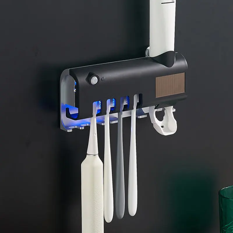 बाथरूम के लिए दीवार पर लगने वाला स्वचालित टूथब्रश होल्डर सेट स्मार्ट टूथब्रश होल्डर कीटाणुनाशक टूथब्रश होल्डर