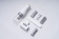 Appareil portable de toilettage et d'aspiration pour animaux de compagnie avec accessoires multiples