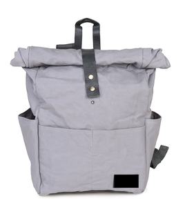 Mochila enrollable de lona encerada y piel auténtica - Product Image 1